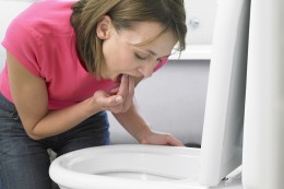 Woman vomiting