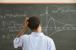 High School Student Working With Graph